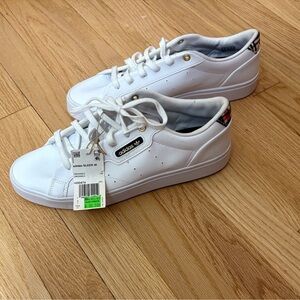 adidas White Low-Top Sneakers with Gold Accent